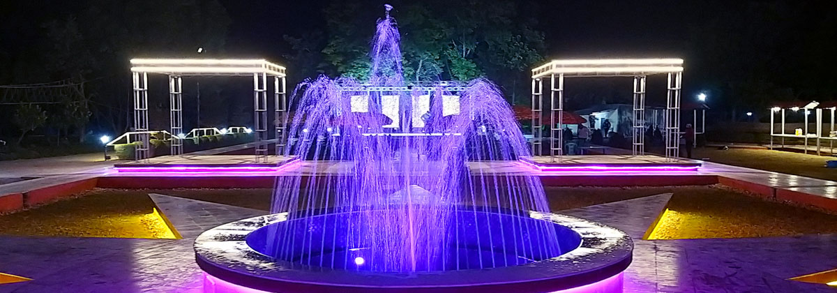 The colored fountain at the event ground with decorative lights and open air stages